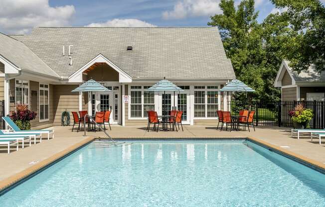 Apartments in Elk River MN_pool with patio furniture around the deck