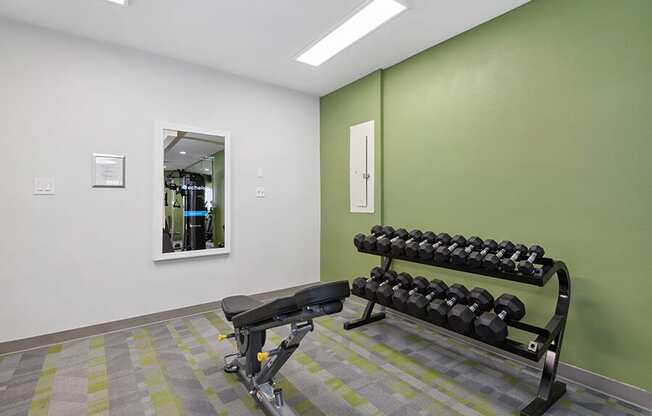 Community Fitness Center with Equipment at Crystal Creek Apartments in Phoenix, AZ.