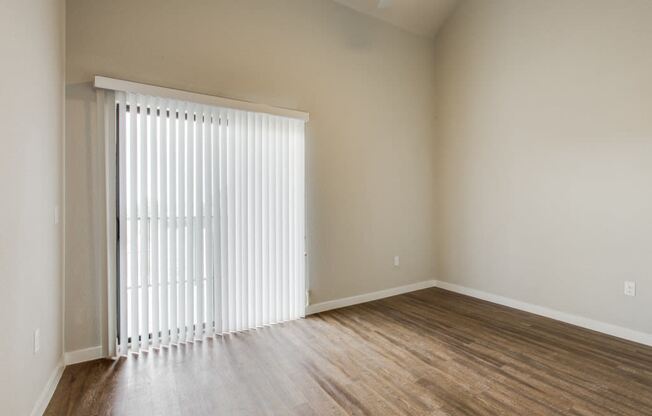 Wood Floor Living Room at Aviator at Brooks Apartments, Clear Property Management, Texas