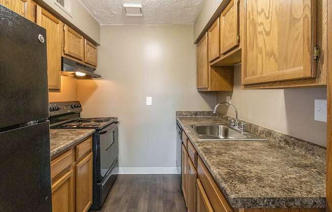 This is a photo of the kitchen of an upgraded 950 square foot, 2 bedroom apartment at Deer Hill Apartments in Cincinnati, OH.