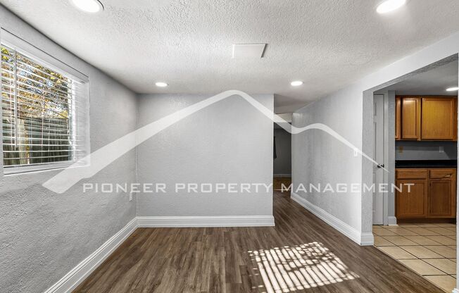 Quaint Home with Fenced Yard and Detached Garage!