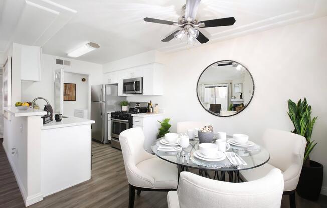 a kitchen with a table in a room