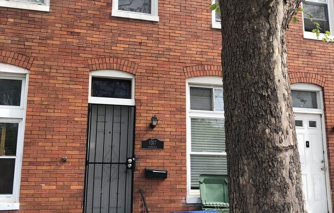 2 Bedroom 1 bathroom with central air townhouse for rent in Baltimore City!