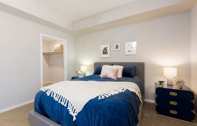 Carpeted Bedroom With Walk-In Closet At Union at Roosevelt Apartments In Phoenix, AZ