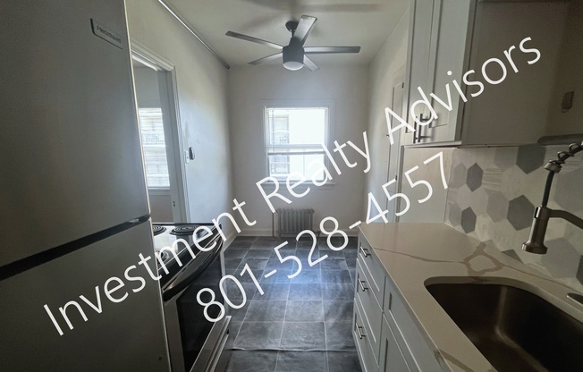 141 E 1 AVE