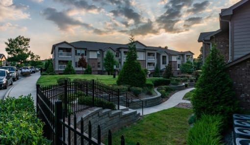 a view of an apartment complex with a sunset in the background at Echo at Lake Norman, Mooresville, NC