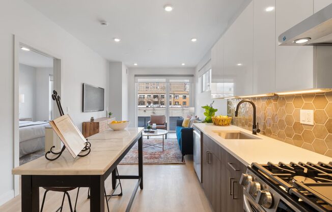 a kitchen with a counter top and a sink