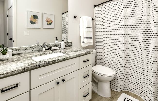 Large bathrooms with granite countertops at Edge 204 Apartments in Omaha, NE