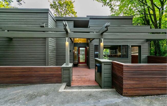 Stunning Contemporary Architectural Gem Near NW 23rd in the Coveted West Hills Arlington Heights Neighborhood!