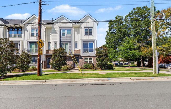 Modern 4-Story Townhome with Private Rooftop Terrace & 2-Car Garage
