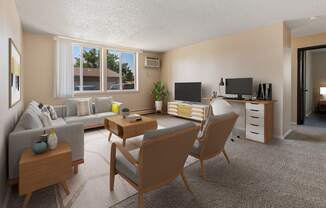 a living room with a couch and a table and chairs