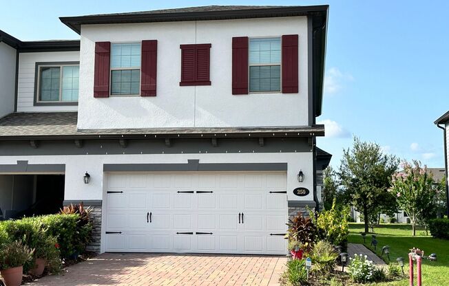 Lease this 3BR End-Unit Townhome in Gated Community with Water View!