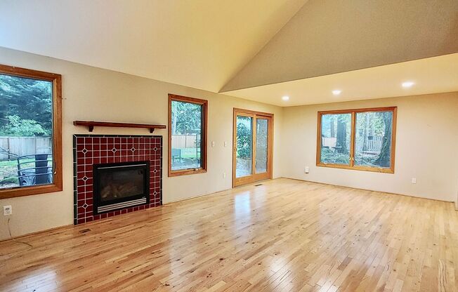 Check Out This Beautiful Home Nestled In The Trees That Sits On A Huge Lot In Lake Oswego!