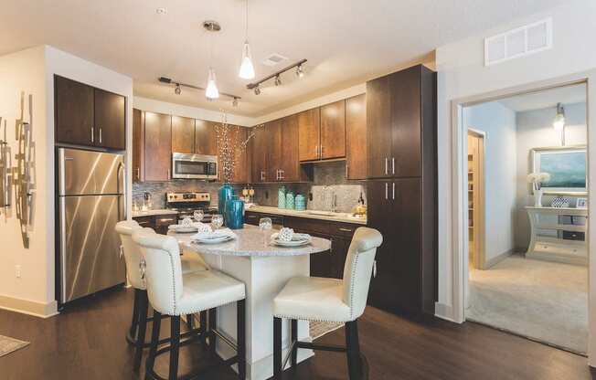 Kitchen with track and pendant lighting  at LandonHouse Apartments in Lake Nona, Orlando