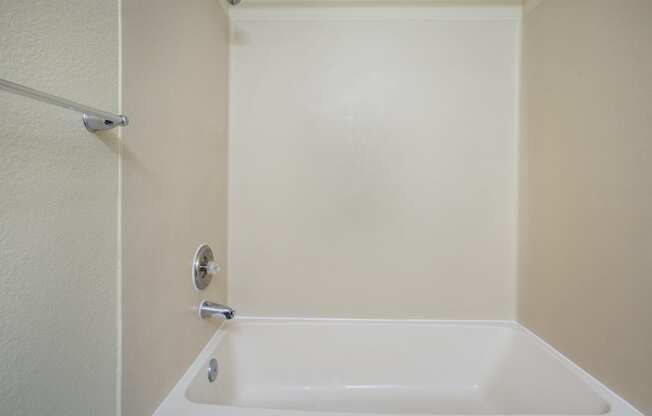 A bathroom with a bathtub and a shower at Arcadia Townhomes, Federal Way, WA