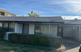1 bedroom 1 bathroom duplex with carport!
