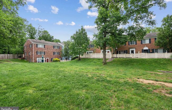 Welcome to this beautifully updated three bedroom, two and a half bath brick townhome in the sought after Parkside at Alexandria.
