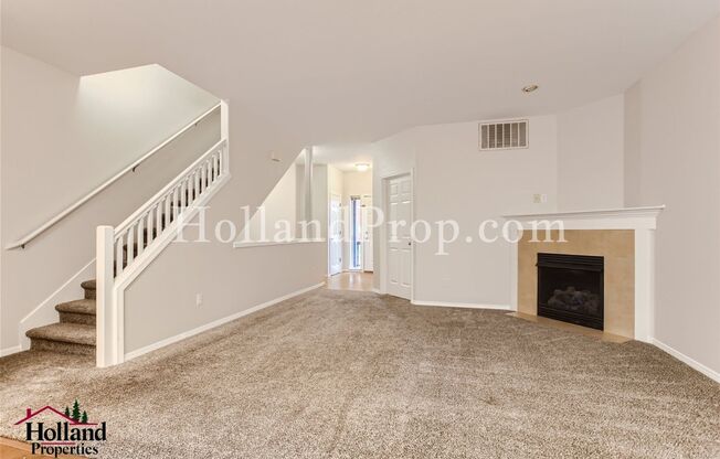 Fantastic Hillsboro Townhouse In Prime Location with new paint and carpet!