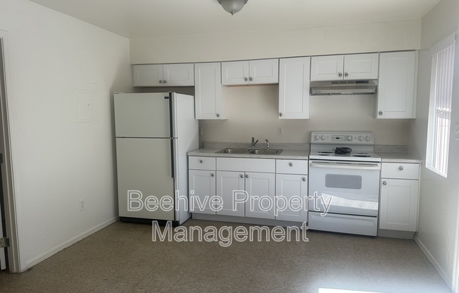 1102 E POLK ST