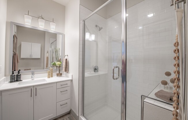 Elevate your lifestyle at Sage at Celina Residences with our modern bathrooms, featuring sleek designs and spacious walk-in showers. Enjoy a blend of style and comfort in every detail. Take the next step and schedule your tour today!