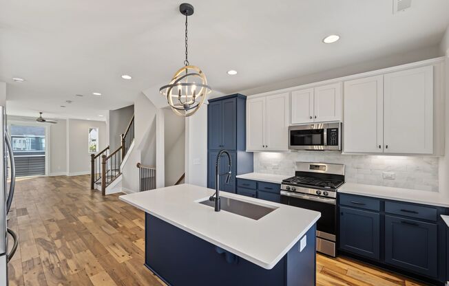 Modern 4-Story Townhome with Private Rooftop Terrace & 2-Car Garage