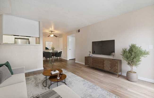 a living room with a couch and a tv