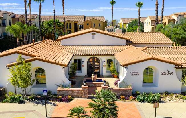 A house with a sign that says "250-M" on the front.