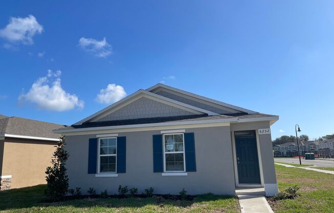 Move in Ready BRAND NEW 4/2 Apopka Home in Windrose!