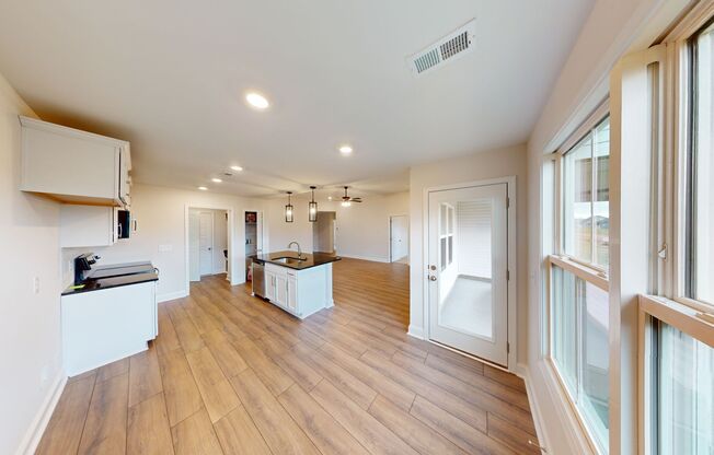 Open-Concept Home with Modern Upgrades Featuring Hardwood Flooring and Open Kitchen