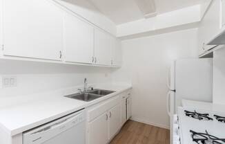 Kitchen with White Appliances and White Cabinets