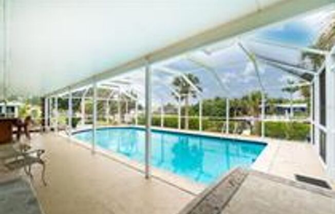 SEASONAL Wonderful WATERFRONT CANAL Charlotte Harbor Access to the Gulf 3 bedroom, 2 bath POOL home