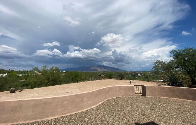 3 Bedroom 2 Bath perched on a scenic overlook with sweeping views of the Tucson Valley and city lights