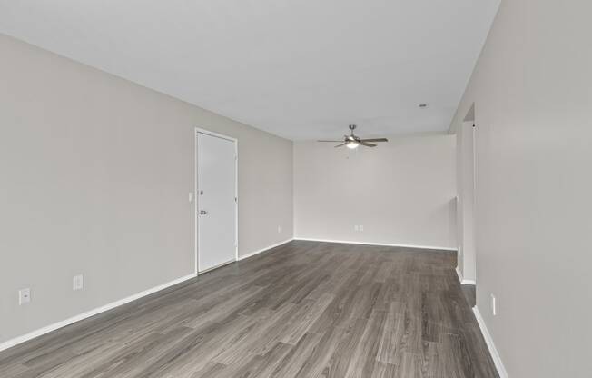 Livingroom with wood style flooring at Creve Coeur, Creve Coeur, MO
