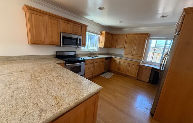Stunning 3 Bed 2 Bath Home | Spacious Backyard | Attached 2 Car Garage