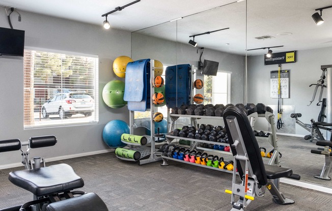 the preserve at ballantyne commons fitness room with weights and other gym equipment