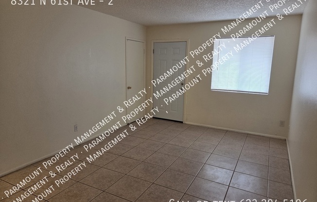8321 N 61 AVE