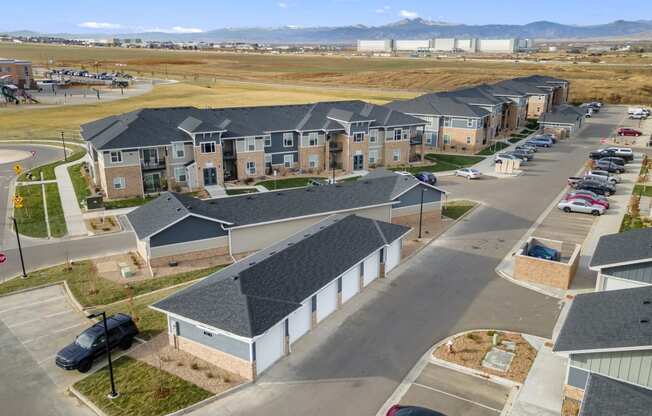 an aerial view of a row of houses on a street