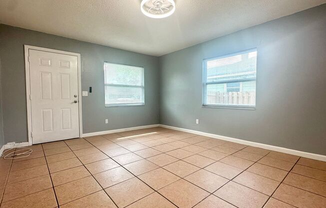 Feel right-at-home in this light-filled 2BR/1BTH with private yard!