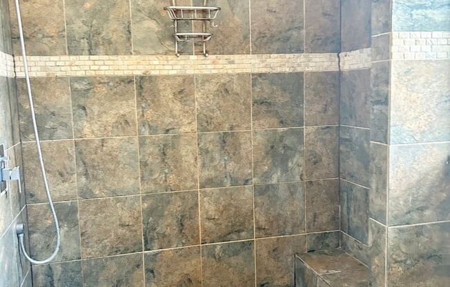 Condo with free heat! In-unit laundry, hardwoods, more!