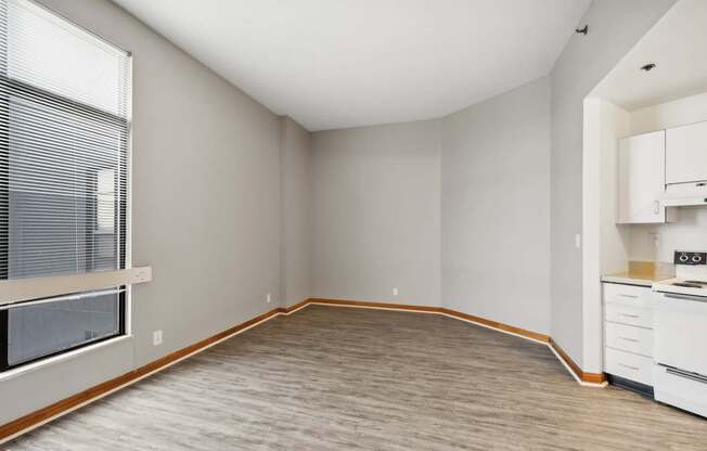 dining room with wood floors and window