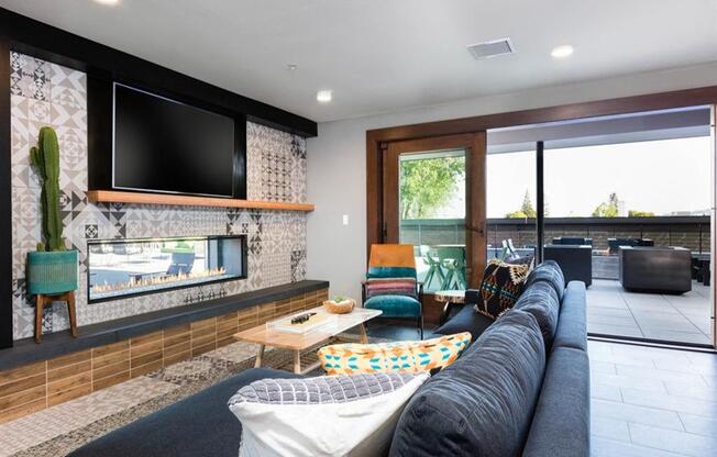 Resident clubhouse with flat screen tv at Cook Street Apartments, Portland, OR 97227