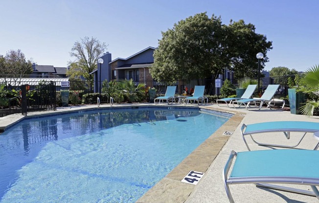 Swimming Pool With Relaxing Sundecks at Water Ridge Apartments, CLEAR Property Management, Irving, Texas
