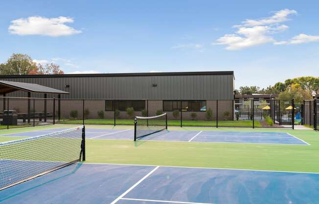 Tennis courts at Villages on McKnight Apartments