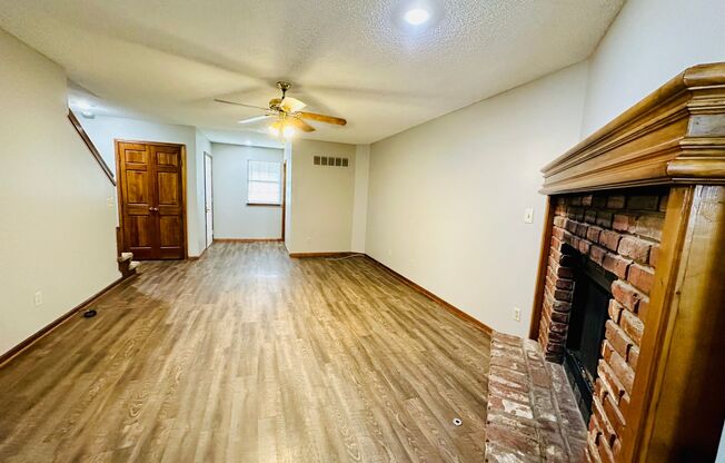 {7209} Spacious Townhome Available Immediately + Fresh Paint & New Carpeting + Two Car Garage