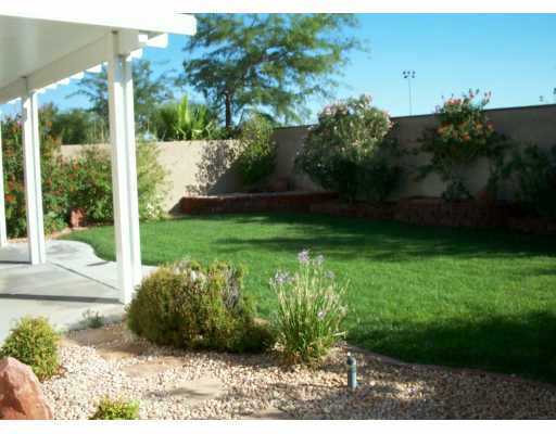 Wonderful Summerlin single story with grass backyard and island kitchen.