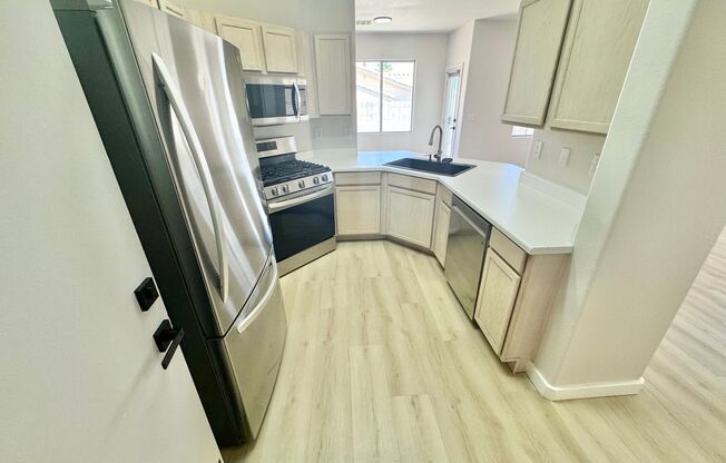BEAUTIFUL NORTHWEST LAS VEGAS HOME WITH OPEN FLOOR PLAN AND SPACIOUS LAYOUT