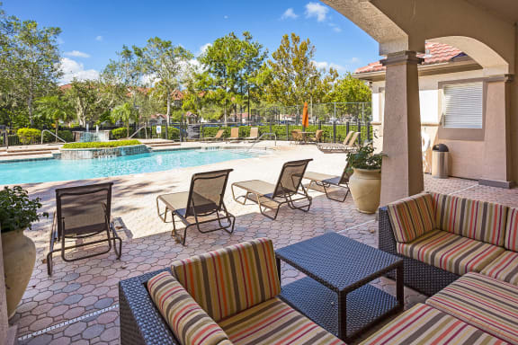 Egret's Landing Apartments poolside cabana with seating