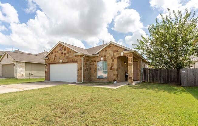 Open Floorpan is Move in Ready just for you! Wood look laminate and Tile run throughout the home with carpet only in the bedrooms.