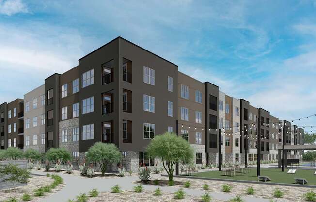 A modern apartment complex with a pool and landscaping at Refinery at Pointe17 Apartments, Phoenix, AZ