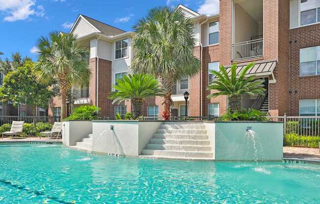 Outdoor Resort Style Pool at Madison on the Meadow Apartments in Stafford, TX 77477